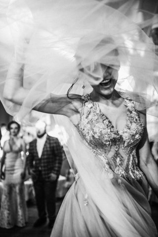 laughing-bride-dances-floor-restaurant.jpg